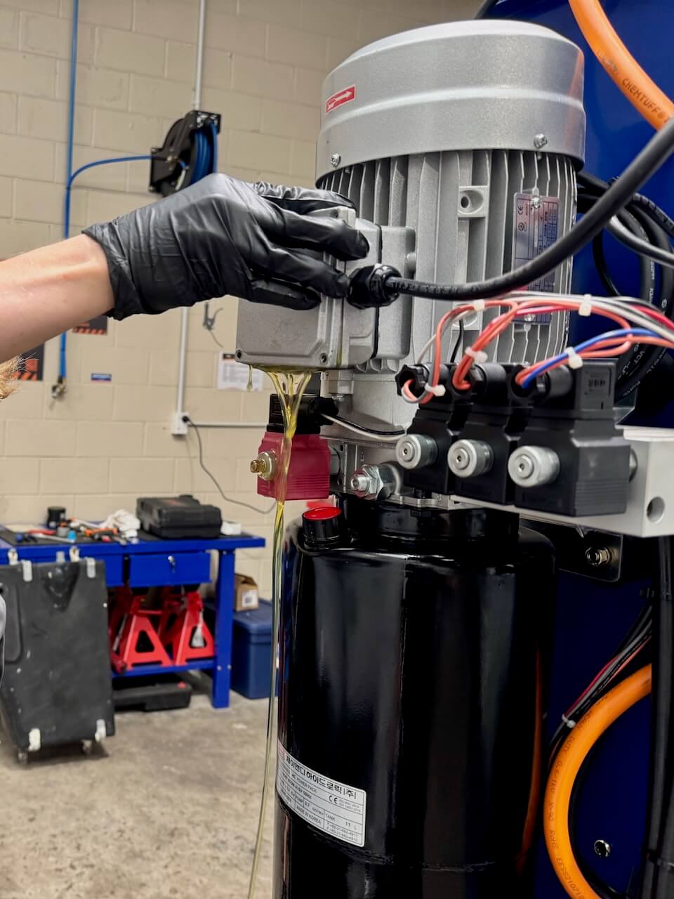 Hydraulic oil pouring from electric motor